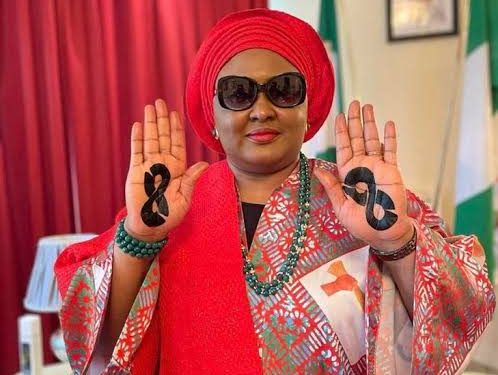 Aisha Buhari tattoos Tinubu’s logo on her palms