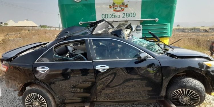 Woman dies as train collides with car in Abuja