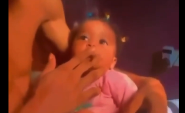 Video of a young man giving his little daughter marijuana to smoke goes viral online