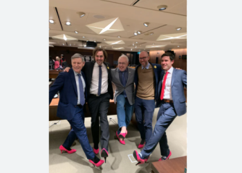 Male lawmakers in Canada wear heels to tackle violence against women