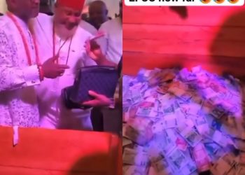 Celebrant devices new means for his guests to spray him money at his party