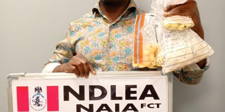 Paris-bound businessman excretes 111 wraps of cocaine at Abuja airport