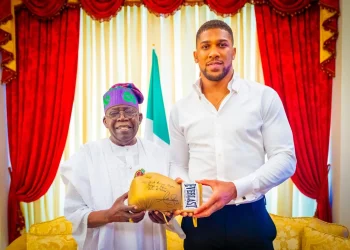 Tinubu hosts Anthony Joshua, receives autographed boxing glove