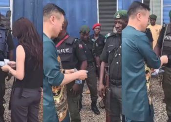 Trending video of police officers lining up to receive N5000 cash gift from their Chinese bosses