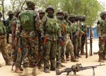 Nigerian military arrests personnel aiding terrorism in north east .
