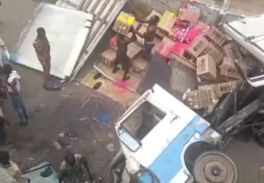 Truck falls off Lagos bridge, lands on bus station