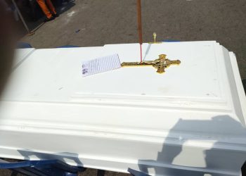 Contractors lay coffin in front of Finance Ministry