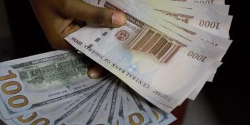 Naira holds gains as rising oil prices support FX market